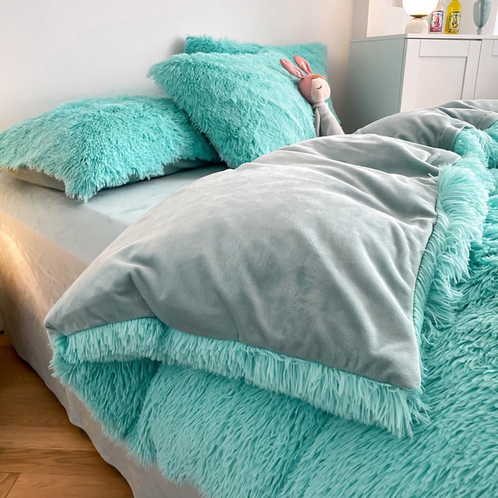 Close-up of the duvet cover from the VibeCore Cloud 9 Bedding Set in the color Aqua, featuring ultra-soft fleece fabric for ultimate comfort and cozy luxury. Perfect for adding warmth, style, and a plush feel to your bedroom or dorm, ideal for sleeping or relaxing.