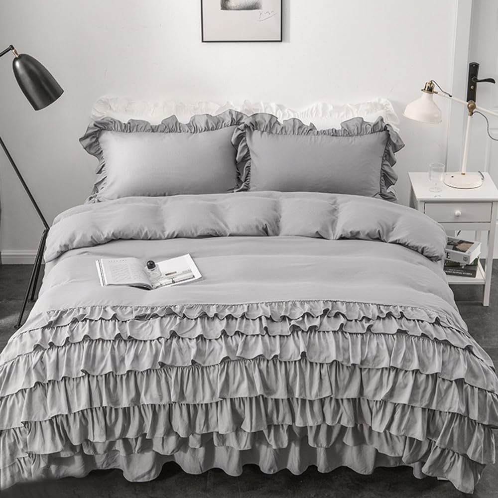 Aerial view of the VibeCore Aesthetic Elegant Ruffles Duvet Cover Set in gray, showcasing the delicate ruffle details and soft, breathable fabric. This dreamy, modern set adds a cozy and chic touch to any bedroom or dorm, perfect for ultimate comfort and style.