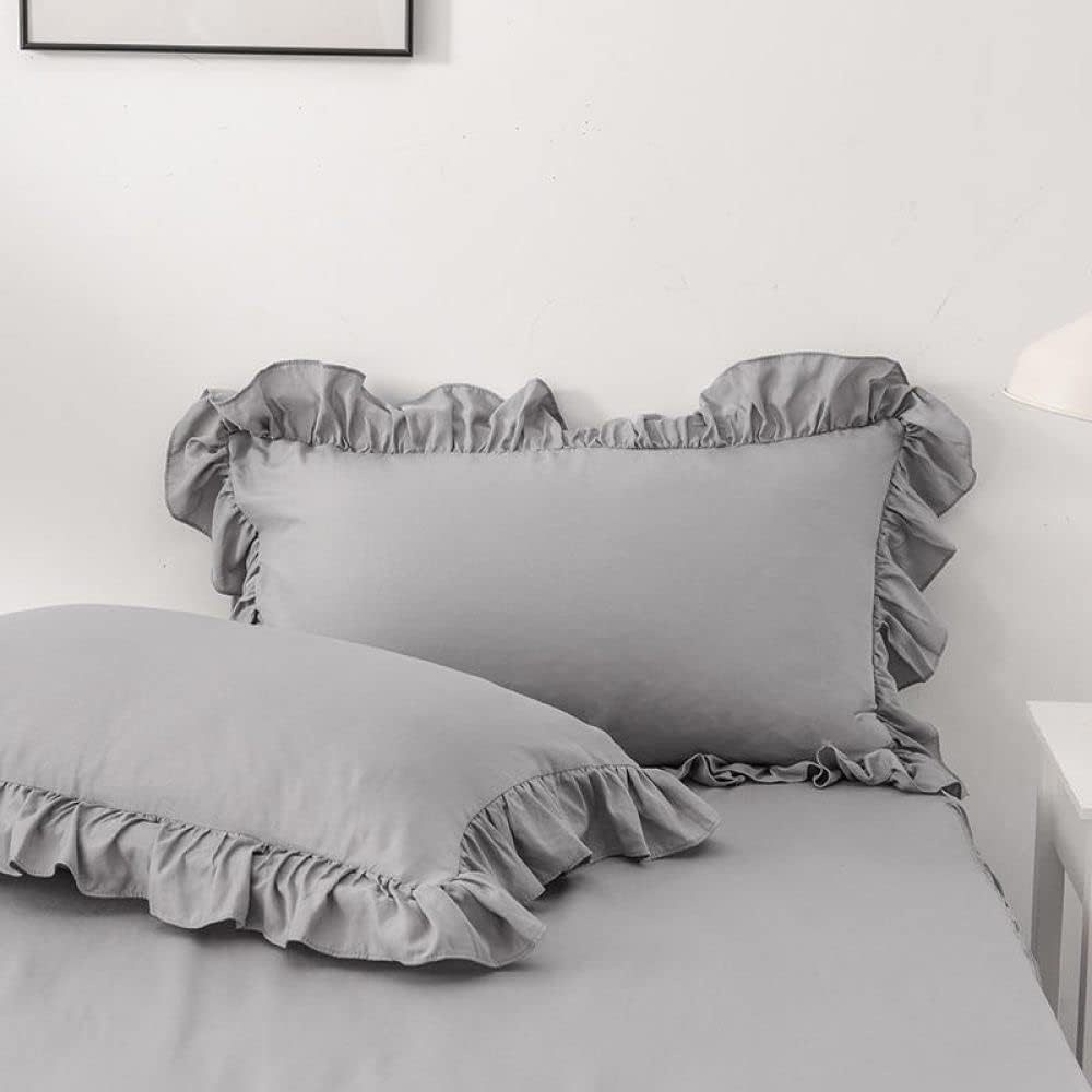 Close-up of the pillowcases from the VibeCore Aesthetic Elegant Ruffles Duvet Cover Set in gray, showcasing the soft ruffle details and smooth, breathable fabric. A stylish and cozy accent to elevate any bedroom or dorm decor.