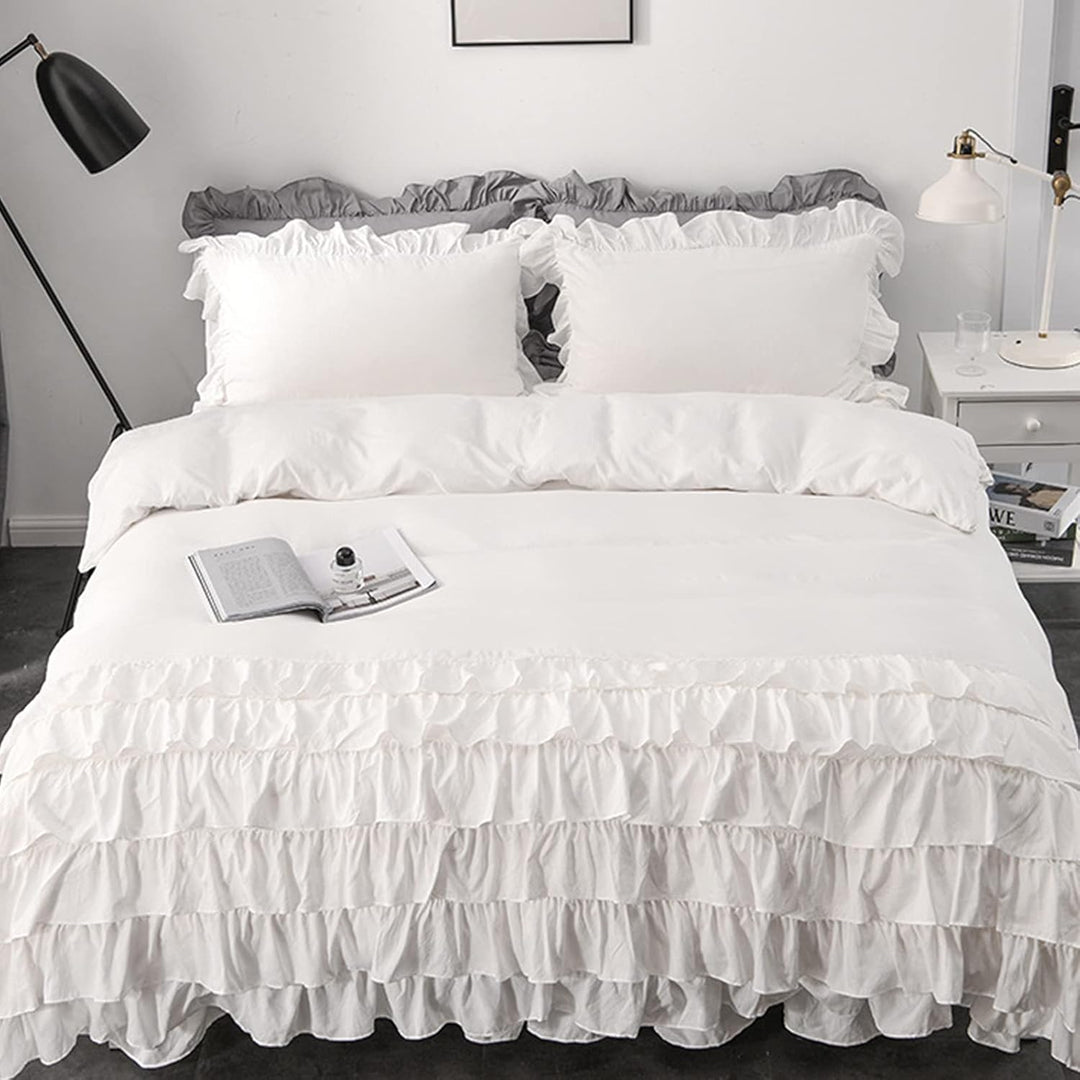 Aerial view of the VibeCore Aesthetic Elegant Ruffles Duvet Cover Set in white, showcasing the delicate ruffle details and soft, breathable fabric. This dreamy, modern set adds a cozy and chic touch to any bedroom or dorm, perfect for ultimate comfort and style.