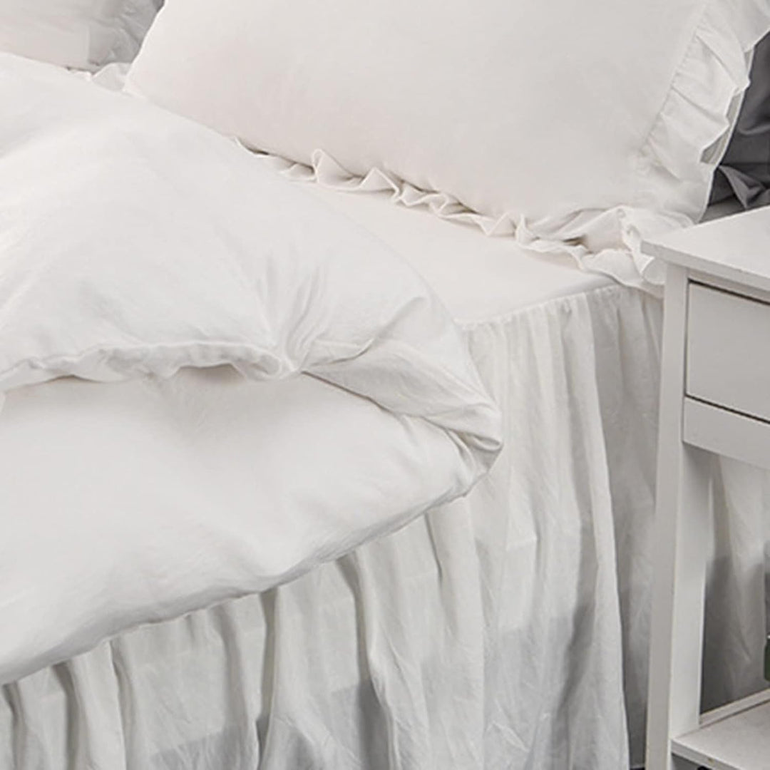 Close-up view of the sheet from the VibeCore Aesthetic Elegant Ruffles Duvet Cover Set in white, featuring the soft, breathable fabric and subtle ruffle accents. A cozy and stylish addition to elevate the comfort and aesthetic of any bedroom or dorm.