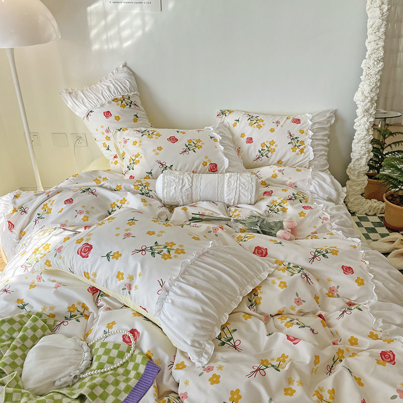 Aerial close-up of the VibeCore Aesthetic Florals and Ruffles Pleated Edge Duvet Cover Set, showcasing the delicate rose floral design and elegant pleated edges for a refined, romantic look.