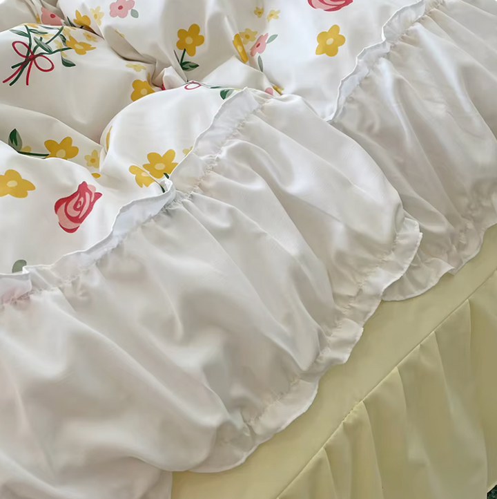 Close-up of the VibeCore Aesthetic Florals and Ruffles Pleated Edge Duvet Cover Set, highlighting the delicate rose floral print and soft white pleated edges for an elegant, feminine touch.
