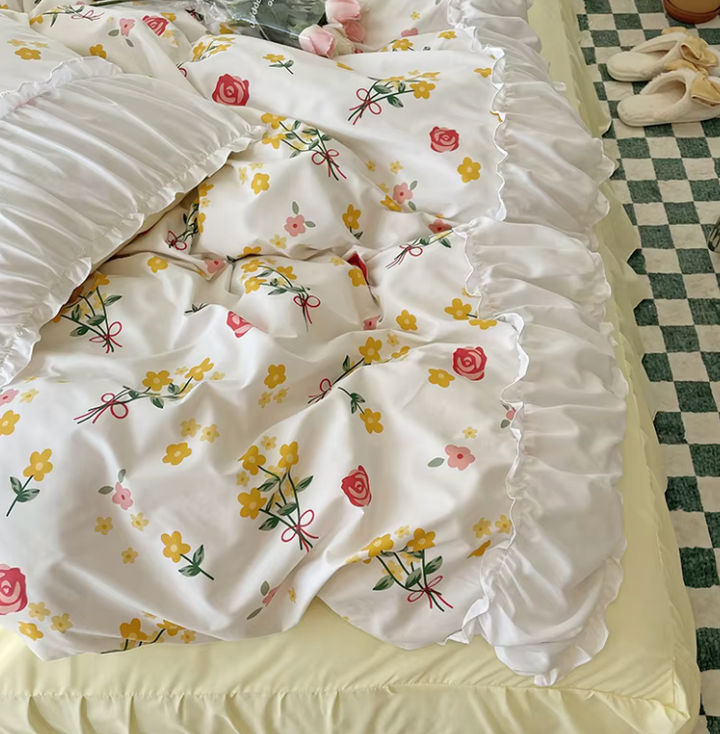 Close-up of the VibeCore Aesthetic Florals and Ruffles Pleated Edge Duvet Cover Set, focusing on the intricate rose floral pattern and detailed pleated edges, offering a chic and romantic touch to your bedding.