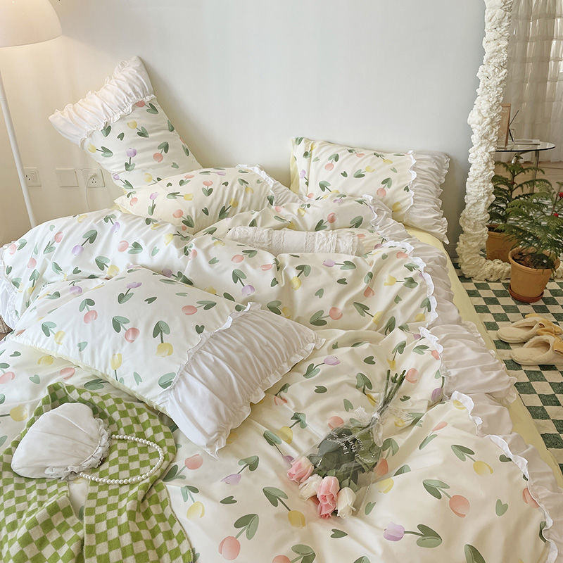 Aerial view of the VibeCore Aesthetic Florals and Ruffles Pleated Edge Duvet Cover Set featuring vibrant tulip prints, accented with delicate ruffles and pleated edges for a charming, feminine touch to your bedroom decor.