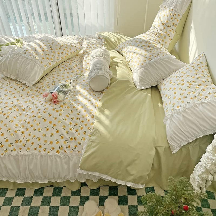 Side view of the VibeCore Aesthetic Florals and Ruffles Pleated Edge Duvet Cover Set, showcasing its delicate yellow daisy floral print with elegant ruffles and pleated edges, offering a soft and romantic touch to your bedroom.