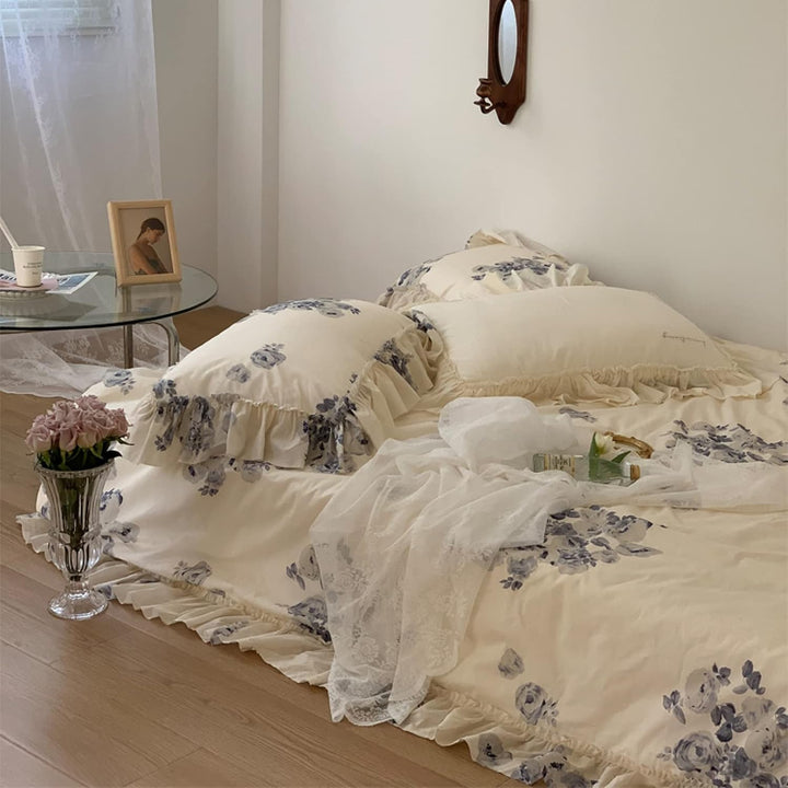 Aerial view of the VibeCore Aesthetic Flower Ink French Ruffles Duvet Cover Set, highlighting the detailed floral ink design and elegant ruffled edges, creating a chic, cozy atmosphere for any bedroom or dorm.