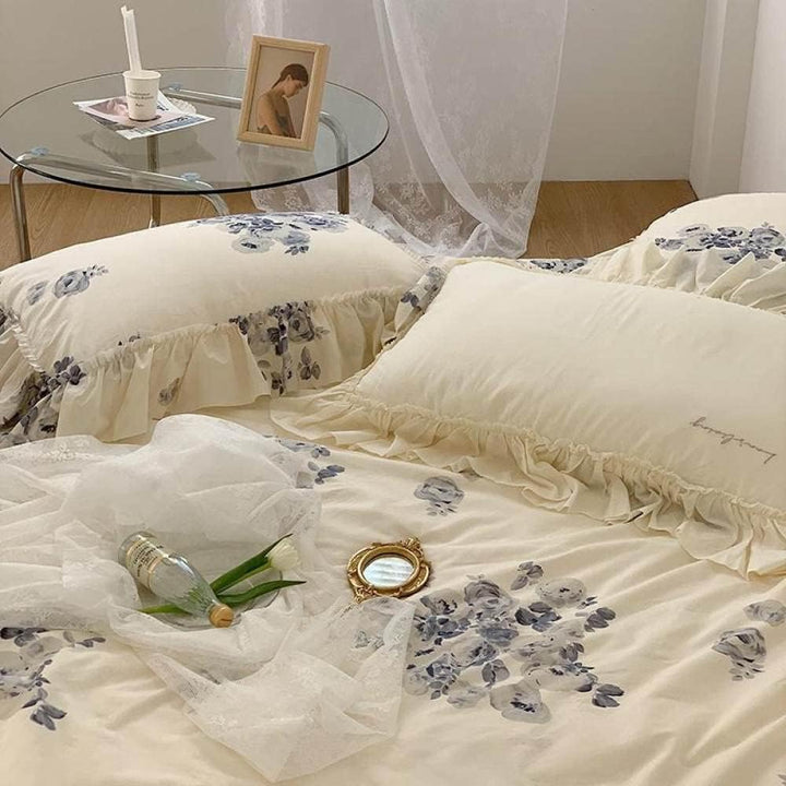 Close-up of the VibeCore Aesthetic Flower Ink French Ruffles Duvet Cover Set, showcasing the plush, cozy texture and intricate floral ink design with soft ruffled edges, perfect for a relaxed, stylish bedroom  or dorm vibe.