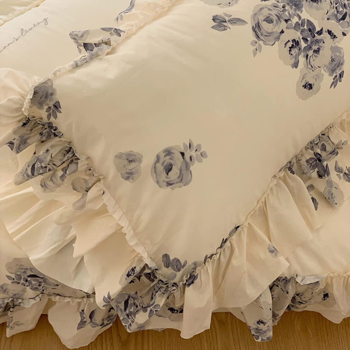 Close-up of the VibeCore Aesthetic Flower Ink French Ruffles Duvet Cover Set pillowcase, featuring a beautiful floral ink design with soft, elegant French ruffles, adding a sophisticated and feminine touch to your bedding.