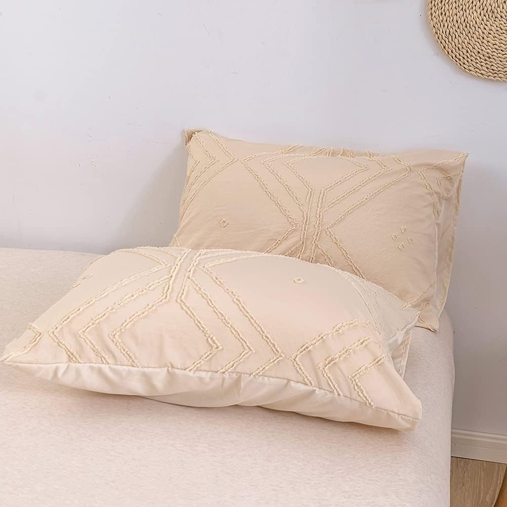 Beige pillowcases from the VibeCore Aesthetic Free Spirit Tufted Duvet Cover Set, showcasing the plush tufted texture and soft, cozy fabric that complements the boho-chic vibe of your bedroom decor.