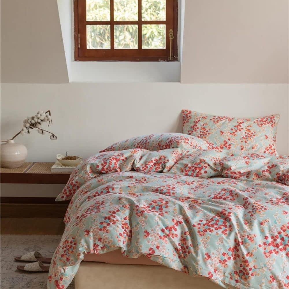 Left front view of the VibeCore Aesthetic Japanese Blossom Duvet Cover, highlighting the delicate floral blossom pattern on soft, breathable fabric, perfect for adding a serene, nature-inspired touch to your bedroom or dorm decor.