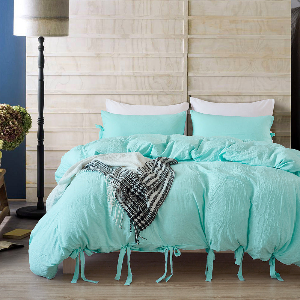 Aerial view of the VibeCore Aesthetic Knot So Ordinary Duvet Cover Set in aqua, featuring a unique knot texture and soft, pastel color that adds a touch of modern charm and cozy elegance to your bedroom or dorm.