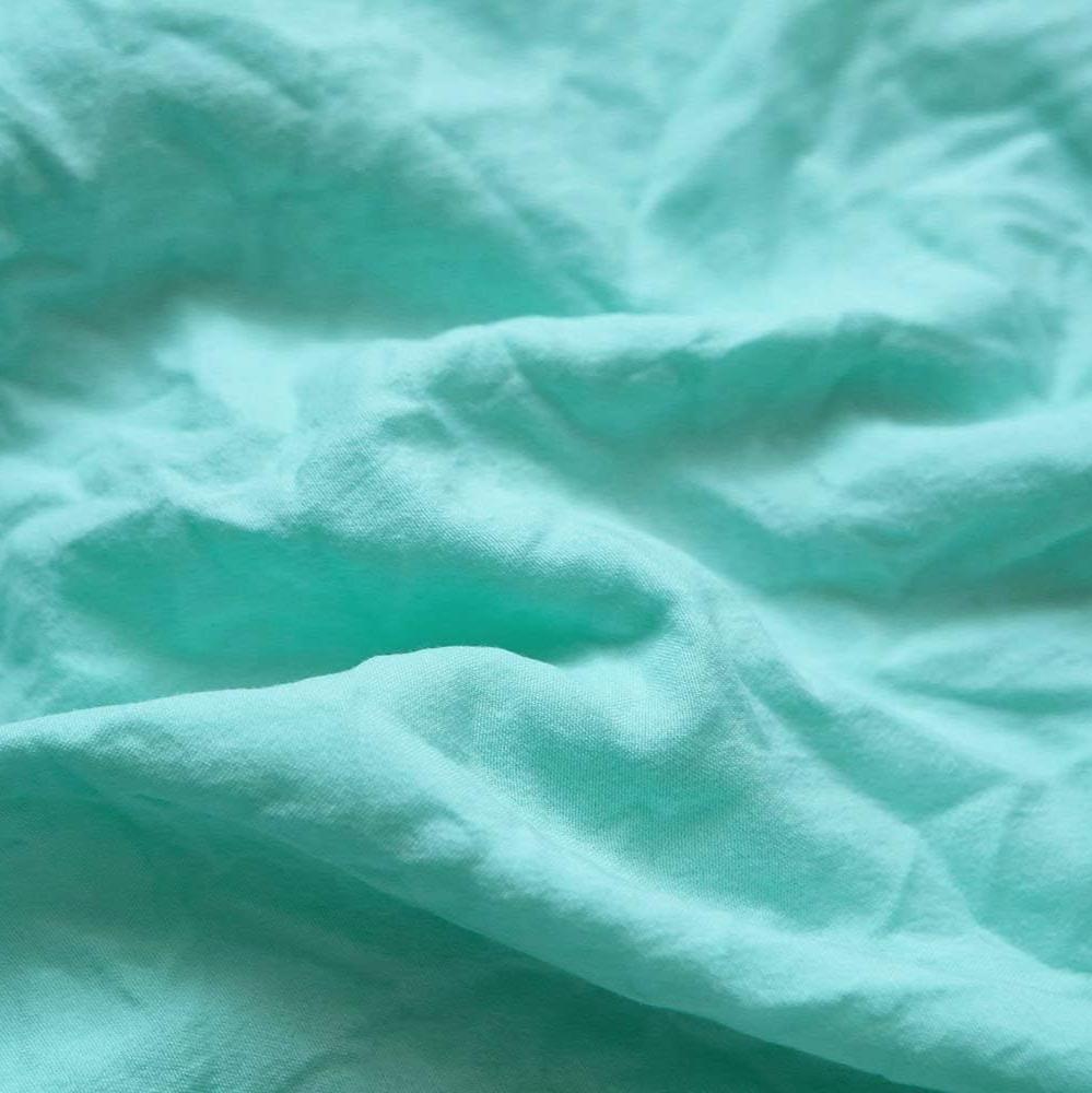 Aerial view of the VibeCore Aesthetic Knot So Ordinary Duvet Cover Set in aqua, featuring a unique knot texture and soft, pastel color that adds a touch of modern charm and cozy elegance to your bedroom or dorm.