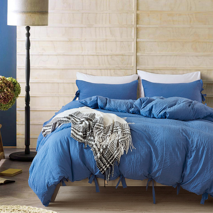Aerial view of the VibeCore Aesthetic Knot So Ordinary Duvet Cover Set in blue, featuring a unique knot texture and soft, pastel color that adds a touch of modern charm and cozy elegance to your bedroom or dorm.