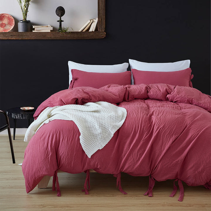 Aerial view of the VibeCore Aesthetic Knot So Ordinary Duvet Cover Set in dusty rose, featuring a unique knot texture and soft, pastel color that adds a touch of modern charm and cozy elegance to your bedroom or dorm.
