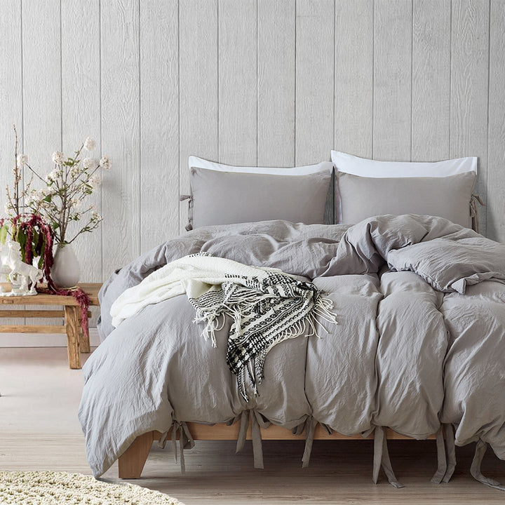 Aerial view of the VibeCore Aesthetic Knot So Ordinary Duvet Cover Set in light gray, featuring a unique knot texture and soft, pastel color that adds a touch of modern charm and cozy elegance to your bedroom or dorm.