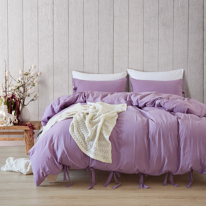 Aerial view of the VibeCore Aesthetic Knot So Ordinary Duvet Cover Set in lilac, featuring a unique knot texture and soft, pastel color that adds a touch of modern charm and cozy elegance to your bedroom or dorm.