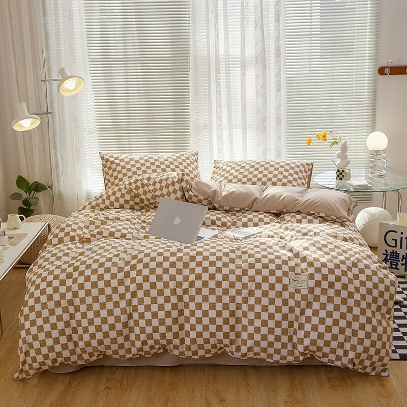 Aerial view of the 'VibeCore Aesthetic Mini Checkered Duvet Cover Set' in Brown, showcasing the modern checkered pattern across the duvet cover and soft, high-quality fabric. The sleek design and fresh color create a chic, stylish atmosphere perfect for any bedroom or dorm.