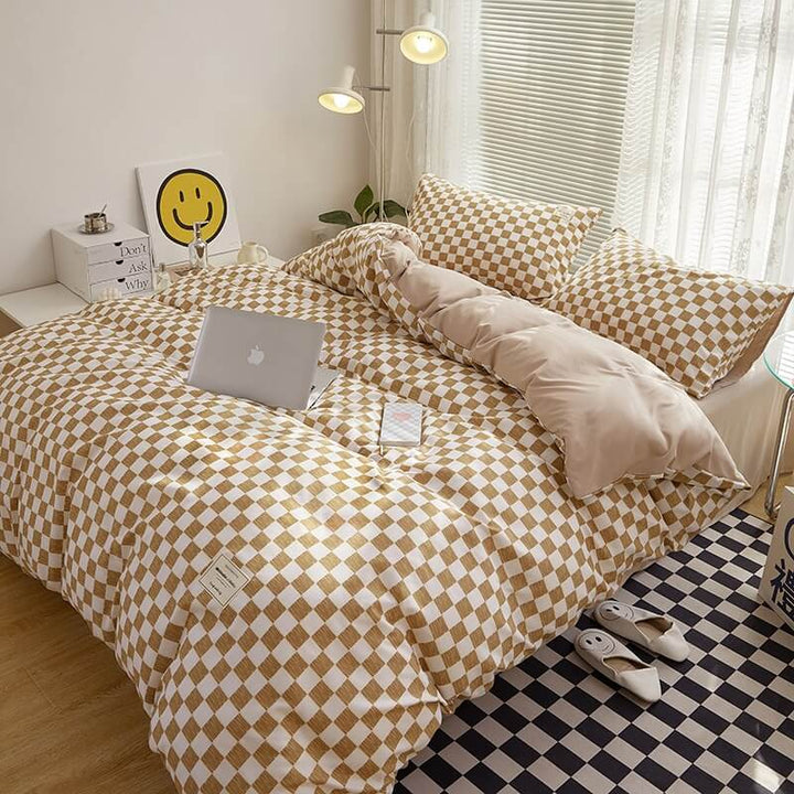 Right angle aerial view of the 'VibeCore Aesthetic Mini Checkered Duvet Cover Set' in Brown, highlighting the modern checkered pattern and soft, durable fabric. The chic design and soothing lilac color add a fresh, contemporary touch to any bedroom or dorm.