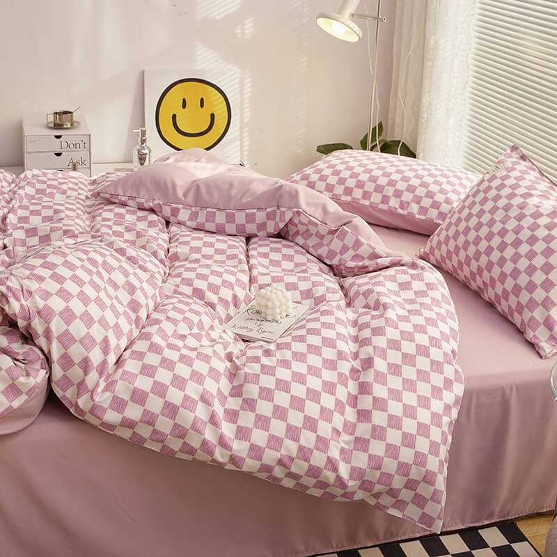 Side right view of the 'VibeCore Mini Checkered Bedding Set' in Lilac, showcasing the sleek, modern checkered pattern. The soft fabric and trendy design create a stylish and comfortable vibe, making it a perfect addition to any bedroom or dorm.
