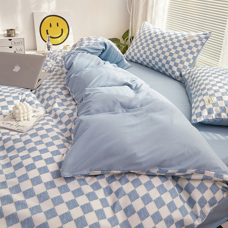 Close-up side view demonstrating the interior of the duvet cover and checkered pattern of the 'VibeCore Mini Checkered Bedding Set' in Sky Blue. The soft, high-quality fabric features a modern, sleek mini checkered design, adding a bold, contemporary touch to the cozy bedding.