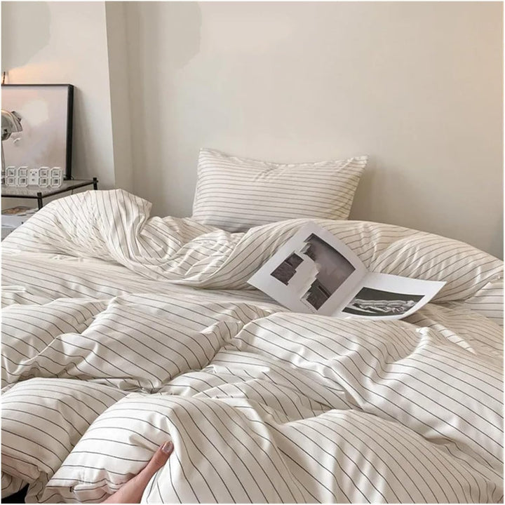 Aerial view of the VibeCore Aesthetic Modern Stripe Duvet Cover Set, showcasing its sleek, contemporary striped design and soft, breathable fabric. A chic and cozy addition to any bedroom or dorm, offering a perfect blend of modern style and comfort.