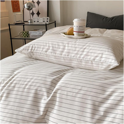 Close-up view of the VibeCore Aesthetic Modern Stripe Duvet Cover Set, emphasizing its cozy, soft fabric and sleek striped pattern. Designed for ultimate comfort, this modern set brings a stylish and inviting touch to any bedroom or dorm.