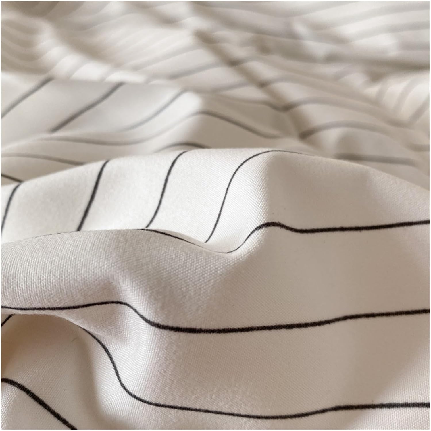 Close-up of the pattern from the VibeCore Aesthetic Modern Stripe Duvet Cover Set, featuring sleek, contemporary stripes in a modern design. Made with soft, breathable fabric, this duvet set adds a stylish and cozy touch to any bedroom or dorm.