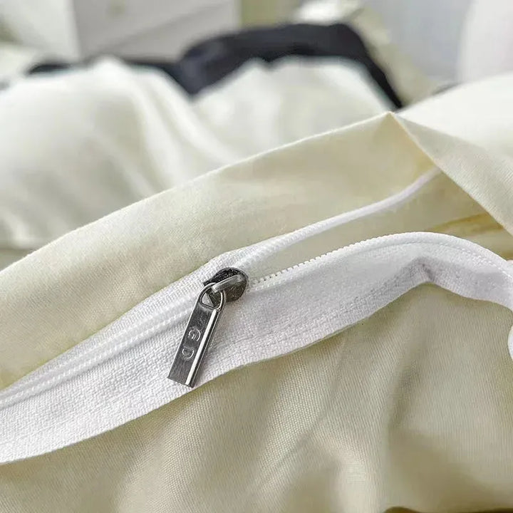Close-up of the zipper detail on the VibeCore Aesthetic Monochrome Wave Duvet Cover Set, highlighting its sleek, durable zipper for easy use and a clean, modern look with a black and white wave design.