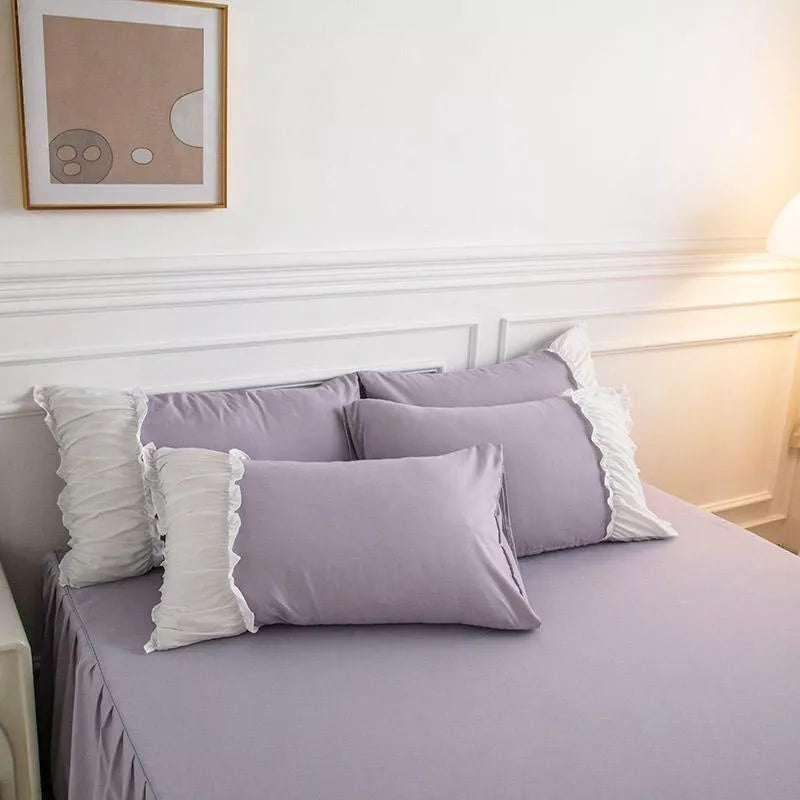 Close-up of the VibeCore Aesthetic Pastel Coquette Duvet Cover Set lilac pillowcase, showcasing its soft, pastel hue and delicate design for a cozy and chic bedroom look.