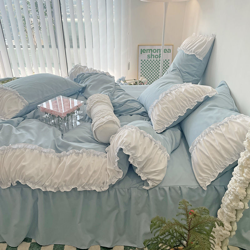 Side view of the VibeCore Aesthetic Pastel Coquette Duvet Cover Set in pastel blue, featuring a soft, cozy texture and an elegant coquette style for a chic and dreamy bedroom look.