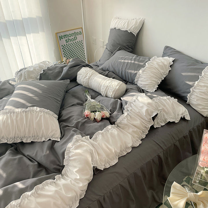 Aerial side view close-up of the VibeCore Aesthetic Pastel Coquette Duvet Cover Set in pastel dark gray, highlighting its soft texture and subtle, modern design for a cozy, stylish bedroom upgrade.