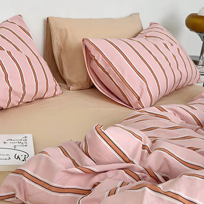 Ultra close-up of pillow covers and stripe pattern on the VibeCore Pink Stripe Bedding Set, made from 100% breathable cotton. The soft pink stripes create a chic, modern look while offering cozy comfort, perfect for elevating your bedroom or dorm decor with effortless style.