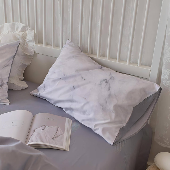 Close-up of the pillowcase from the VibeCore Aesthetic Purple Marble Duvet Cover Set, showcasing the beautiful purple marble design with rich swirls and vibrant tones. Crafted from soft, breathable fabric, this pillowcase brings a luxurious and modern touch to any bedroom or dorm.