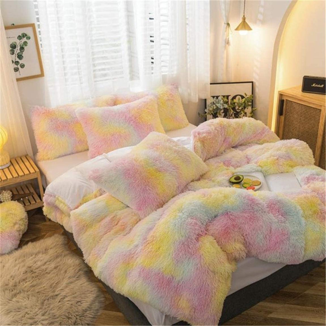 Aerial side view of the VibeCore Rainbow Fluffy Bedding Set in the pastel pink and yellow gradient Ice Cream color, showcasing its plush, ultra-soft fabric and cozy design. The pastel Ice Cream color adds a light, playful touch to your bedroom or dorm, creating a dreamy, inviting atmosphere with luxurious comfort and style.