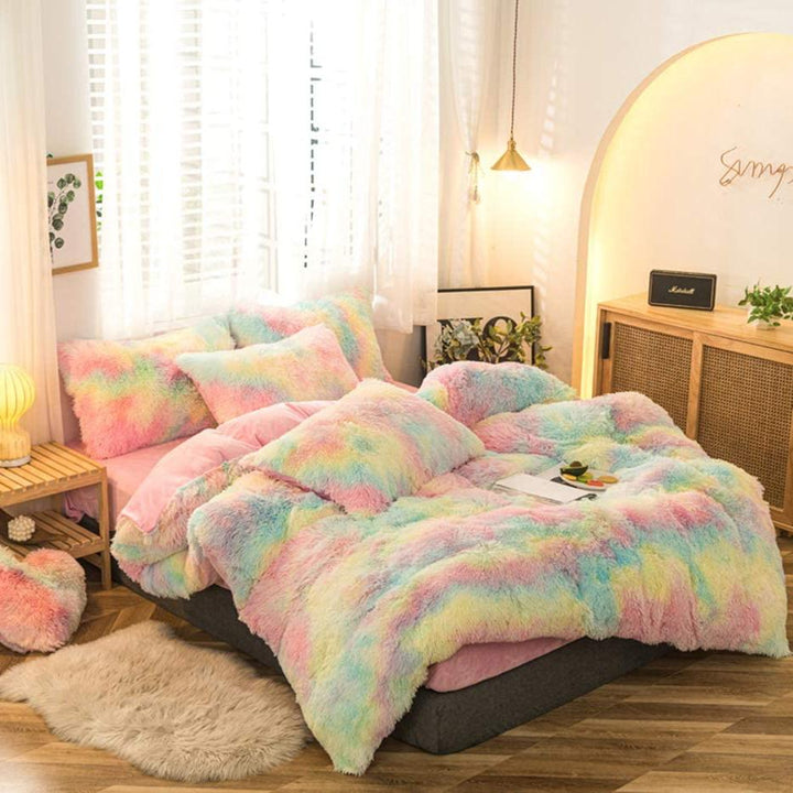 Side aerial view of the VibeCore Rainbow Fluffy Bedding Set in rainbow colors, showcasing its ultra-soft, plush fabric designed for ultimate comfort and warmth. This vibrant bedding set adds a fun, cozy vibe to your bedroom or dorm, perfect for creating an energetic and colorful sleep space.