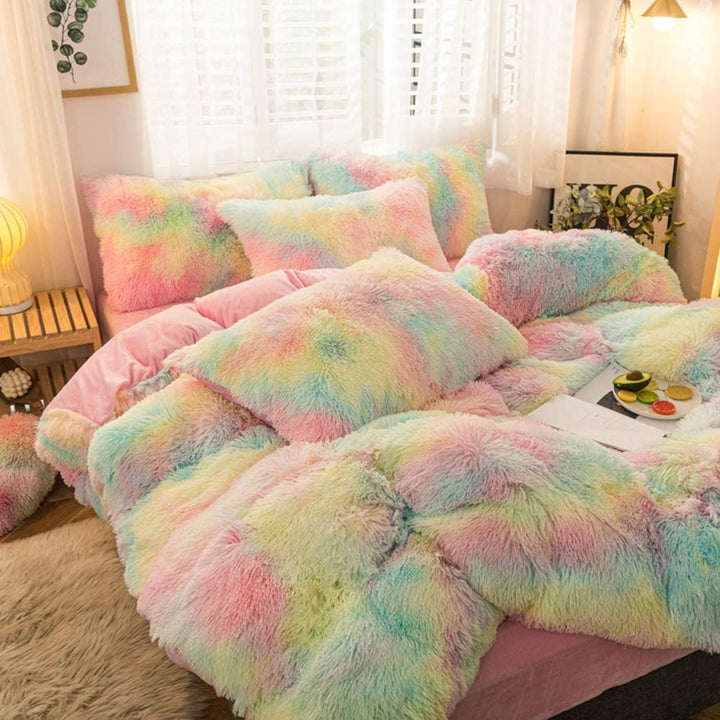 Side close-up view of the VibeCore Rainbow Fluffy Bedding Set in rainbow colors, featuring ultra-soft plush fabric that provides maximum comfort and warmth. This vibrant bedding set brings a cozy, playful touch to your bedroom or dorm, perfect for creating a colorful, energetic sleep space.