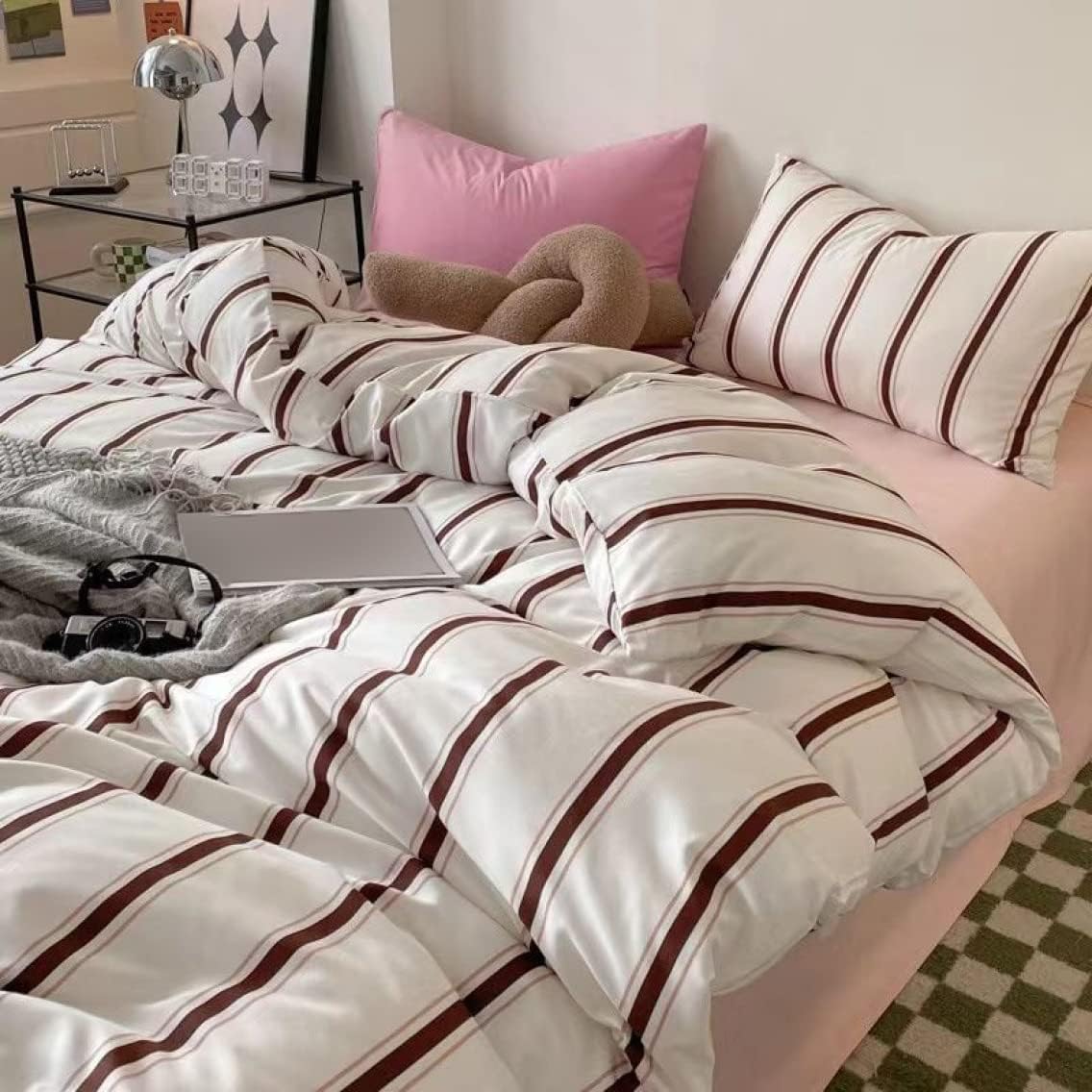 Side angle of the VibeCore Red Stripe Bedding Set, showcasing the bold red stripe pattern and soft cotton-polyester blend fabric. This view highlights the bedding's sleek design, adding a modern touch to your bedroom with a cozy, inviting atmosphere.