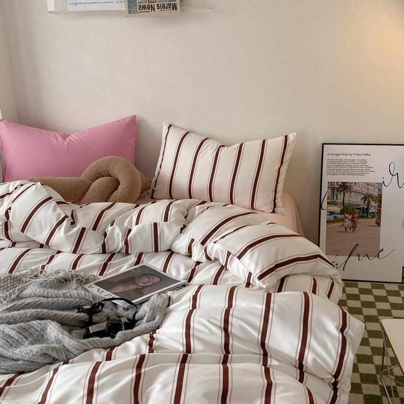 Aerial top view of the VibeCore Red Stripe Bedding Set, showcasing its bold red stripe design on a breathable cotton-polyester blend. This vibrant bedding transforms your bedroom with a cozy yet stylish vibe, perfect for elevating dorms or bedrooms with chic, Pinterest-inspired aesthetics.