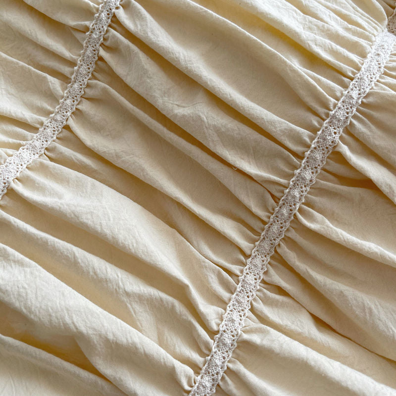 Close-up of the pleated design on the VibeCore Royal Pleated Bedding Set, highlighting the intricate, romantic pleats that add a chic, luxurious touch to the soft cotton fabric.