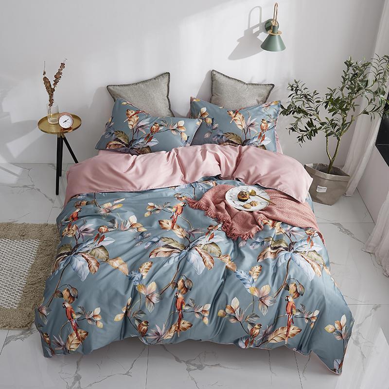Aerial view of the VibeCore Aesthetic Satin Flower Language Duvet Cover, showcasing the luxurious satin texture and intricate floral design. Made from soft, silky fabric, this duvet cover brings an elegant and sophisticated touch to any bedroom or dorm.