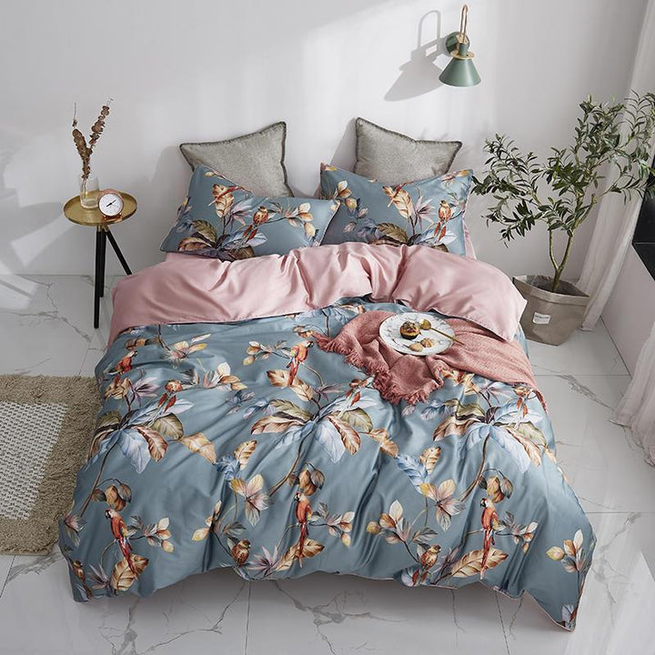 Aerial view of the VibeCore Aesthetic Satin Flower Language Duvet Cover, showcasing the luxurious satin texture and intricate floral design. Made from soft, silky fabric, this duvet cover brings an elegant and sophisticated touch to any bedroom or dorm.