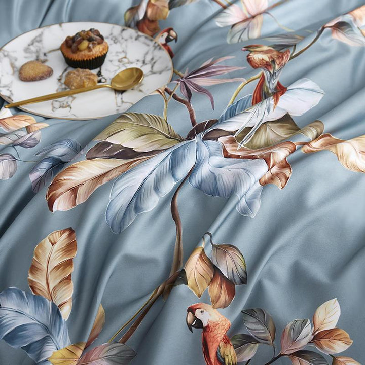 Close-up of the side pattern on the VibeCore Aesthetic Satin Flower Language Duvet Cover, highlighting the delicate floral design on a luxurious satin fabric. The smooth, silky texture and intricate pattern bring an elegant, sophisticated vibe to any bedroom or dorm.