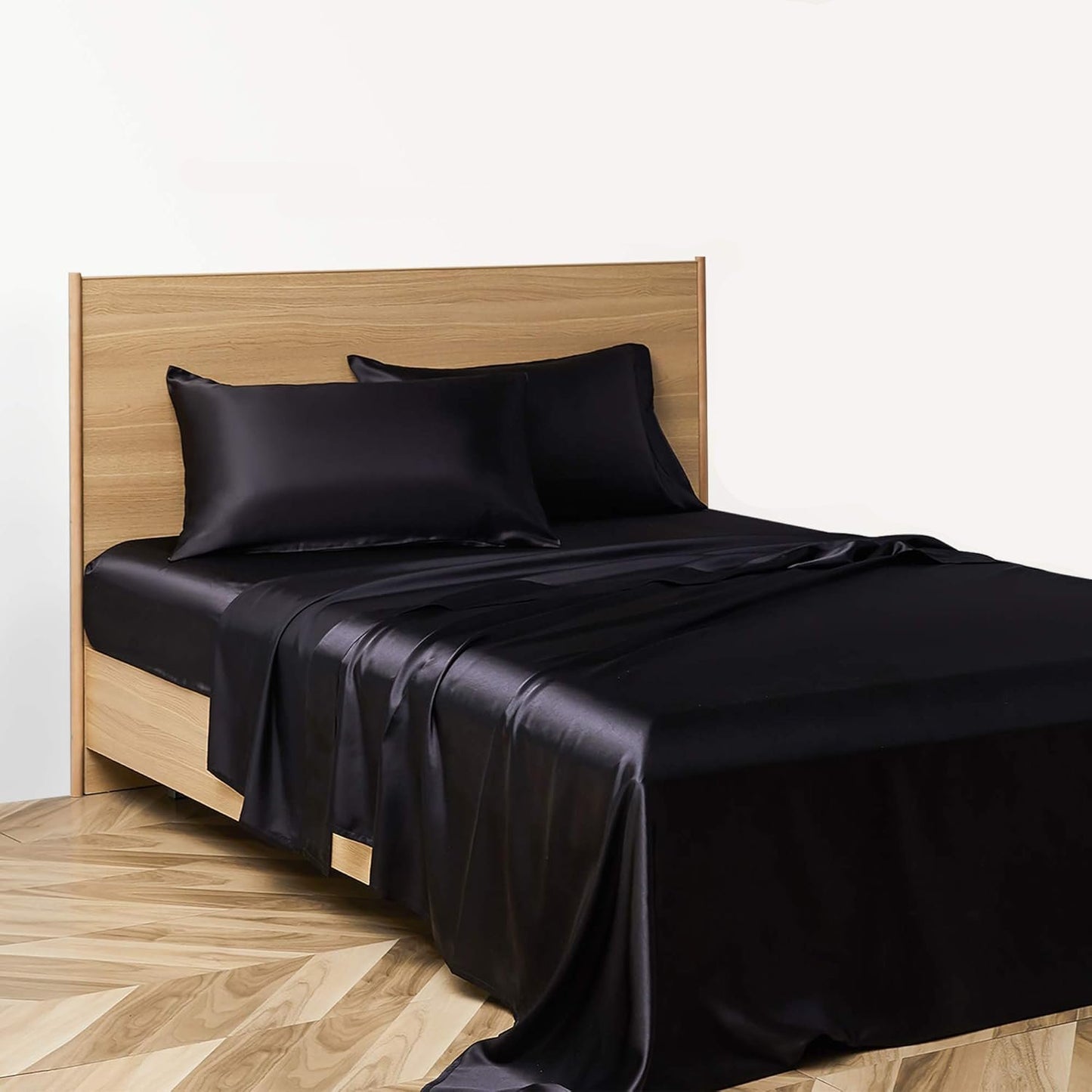 VibeCore Aesthetic Sleek Satin Duvet Cover Set in black, side aerial view, showcasing the smooth satin texture and elegant design for a luxurious bedroom or dorm look.