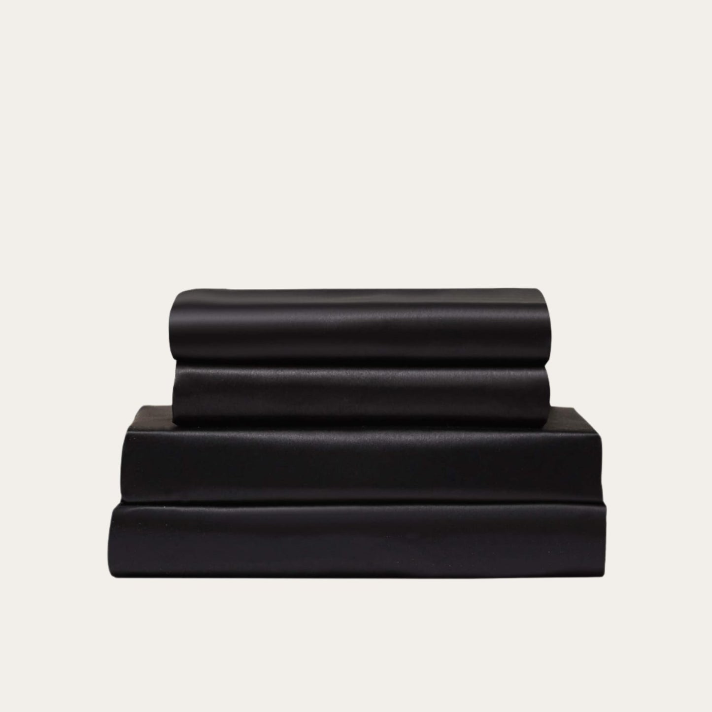 VibeCore Aesthetic Sleek Satin Duvet Cover Set in black, showcasing the complete sheet package including duvet cover, flat sheet, and pillowcases, designed for a luxurious and smooth bedroom and dorm experience.
