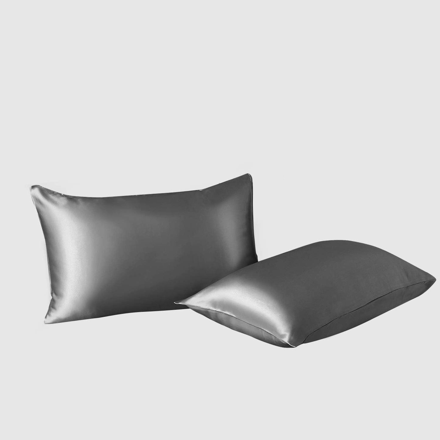 VibeCore Aesthetic Sleek Satin Duvet Cover Set dark gray pillowcases, designed with a smooth, luxurious satin finish to add elegance and comfort to your bedroom or dorm decor.
