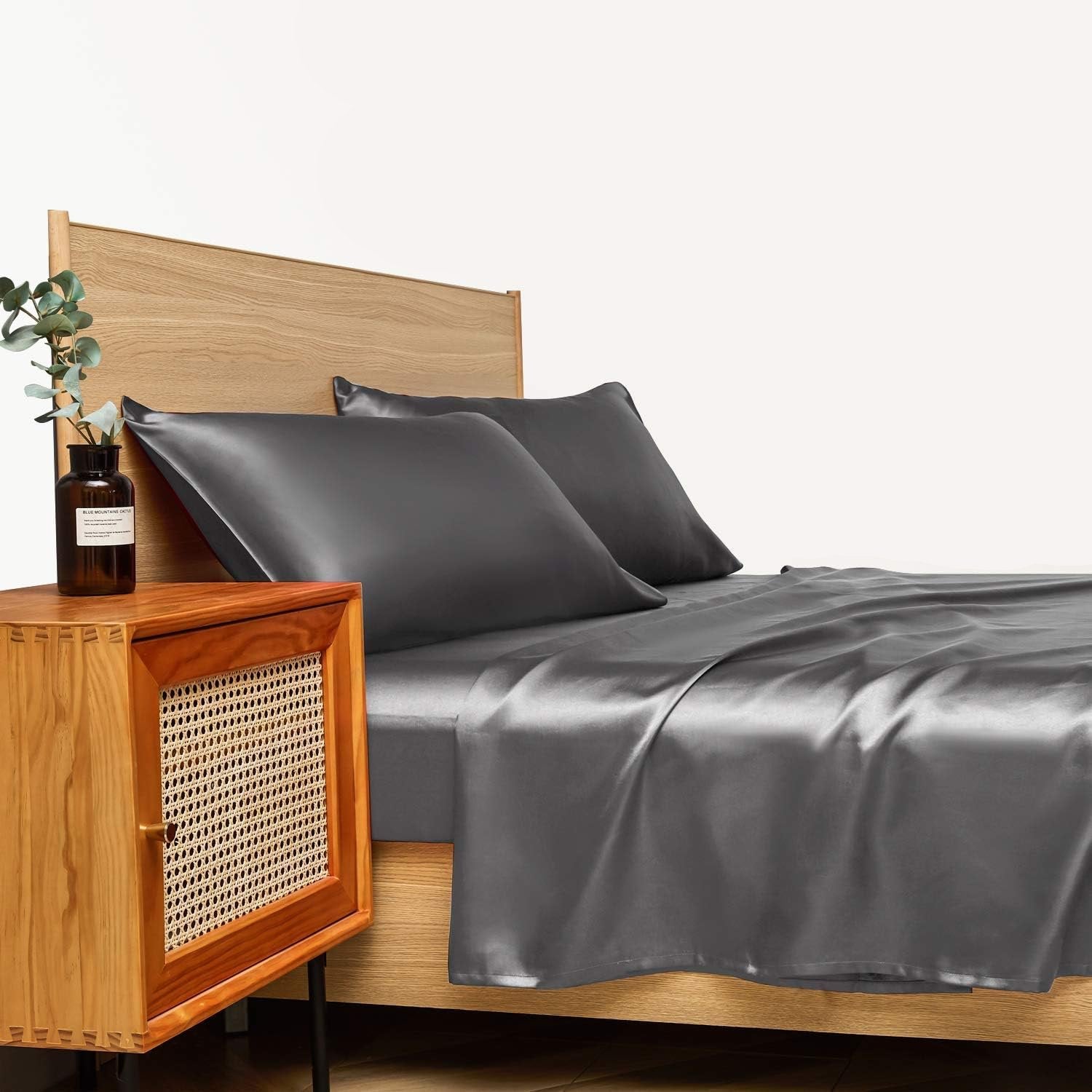 VibeCore Aesthetic Sleek Satin Duvet Cover Set in dark gray, side view, highlighting the rich satin fabric and smooth texture, adding a touch of elegance to your bedroom or dorm.