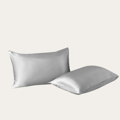 VibeCore Aesthetic Sleek Satin Duvet Cover Set gray pillowcases, designed with a smooth, luxurious satin finish to add elegance and comfort to your bedroom or dorm decor.