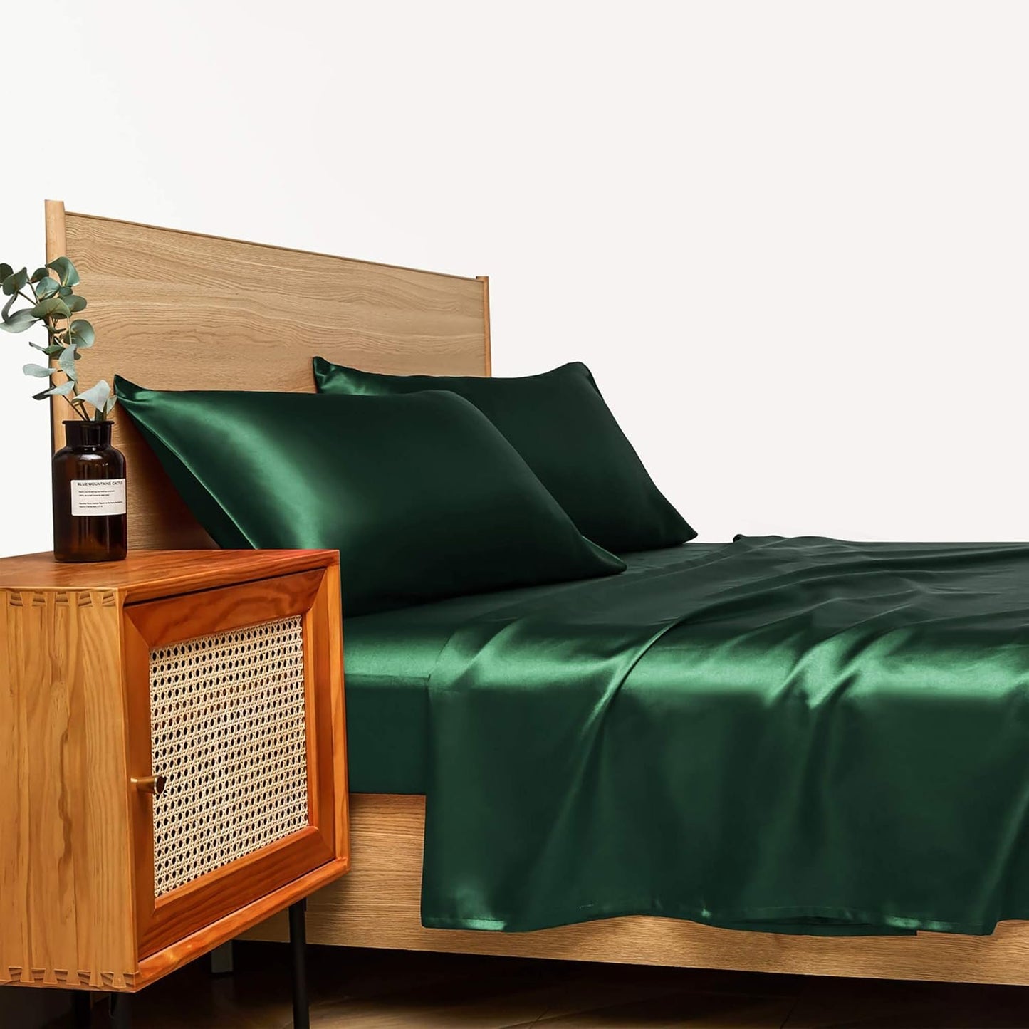 VibeCore Aesthetic Sleek Satin Duvet Cover Set in green, side view, highlighting the rich satin fabric and smooth texture, adding a touch of elegance to your bedroom or dorm.