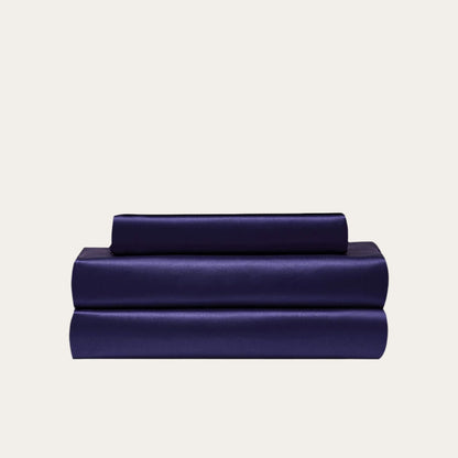 VibeCore Aesthetic Sleek Satin Duvet Cover Set in purple, showcasing the complete sheet package including duvet cover, flat sheet, and pillowcases, designed for a luxurious and smooth bedroom experience.